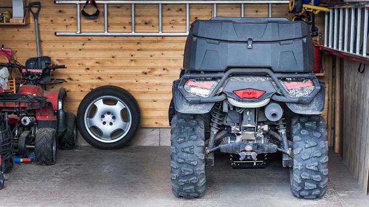 ATV stored in garage.